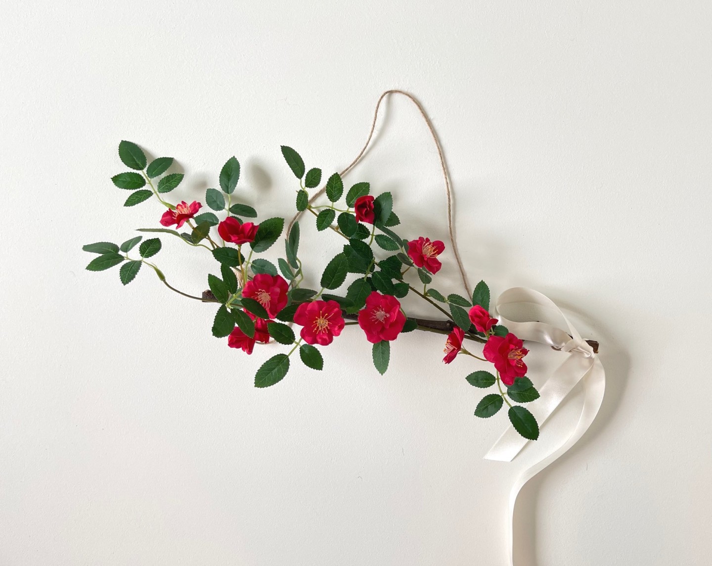 A garland with bright red flowers